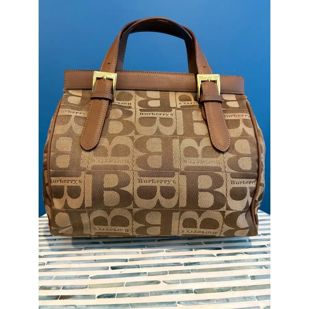 Vintage Burberrys of London with 